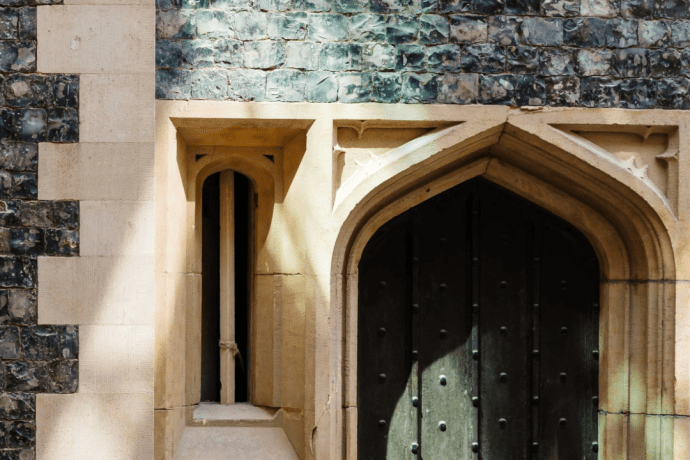 Sunlight falls on flint wall inside new atrium